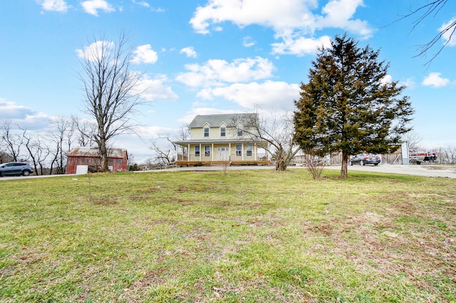 view of front facade with a porch and a front lawn