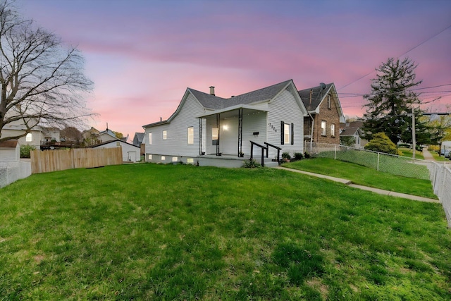 view of front of house with a lawn