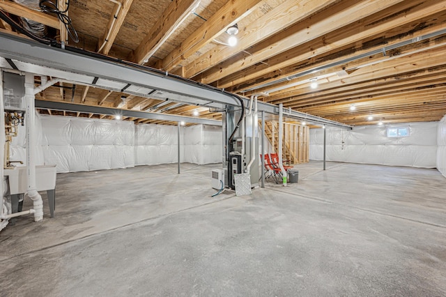 basement featuring heating unit