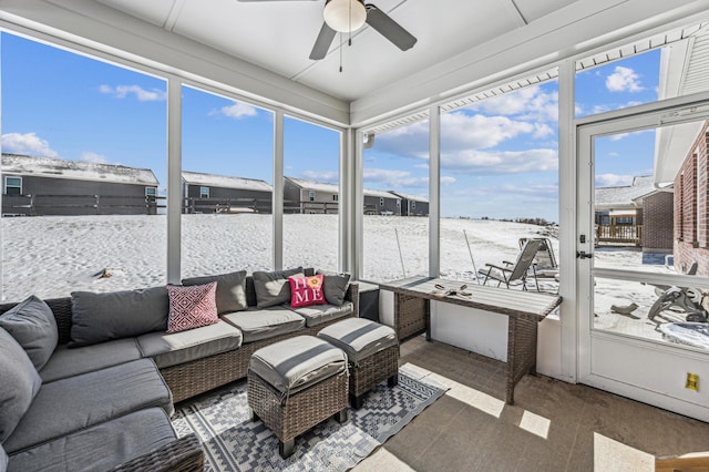 sunroom / solarium with ceiling fan