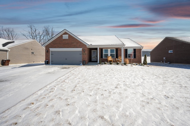 ranch-style home featuring a garage