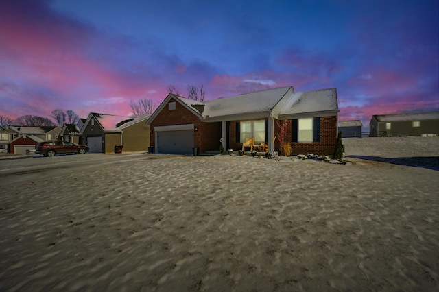 single story home with a garage