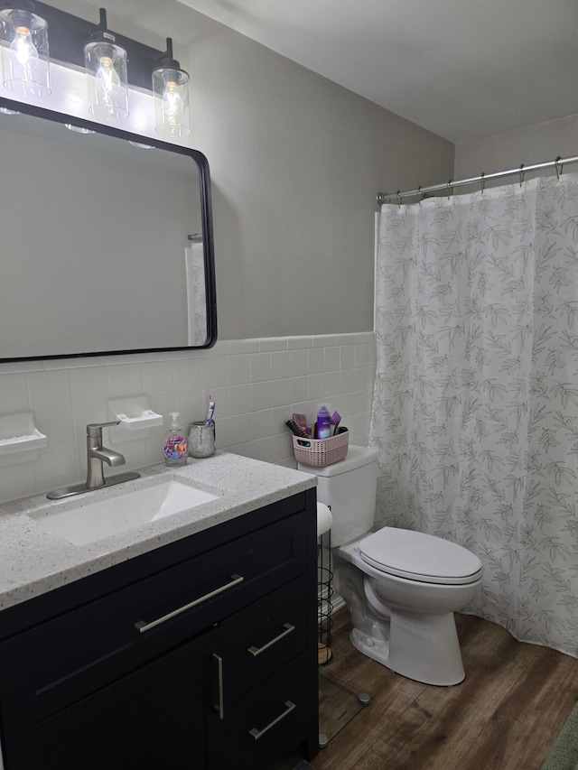 7013 Curtis Way Unit 7013, Florence, KY 41042 - full bathroom with wood finished floors, vanity, wainscoting, tile walls, and a shower with curtain
