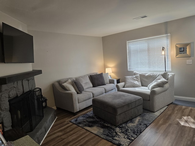 7013 Curtis Way Unit 7013, Florence, KY 41042 - living room featuring wood finished floors and a stone fireplace