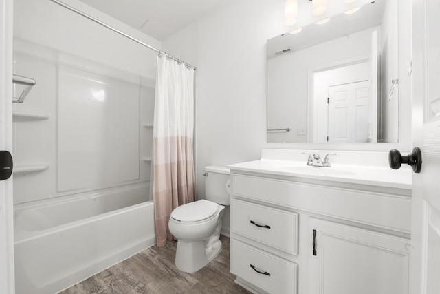 full bathroom featuring toilet, vanity, shower / tub combo, and hardwood / wood-style floors