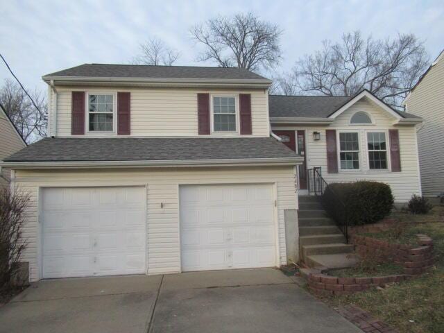 view of front of property featuring a garage