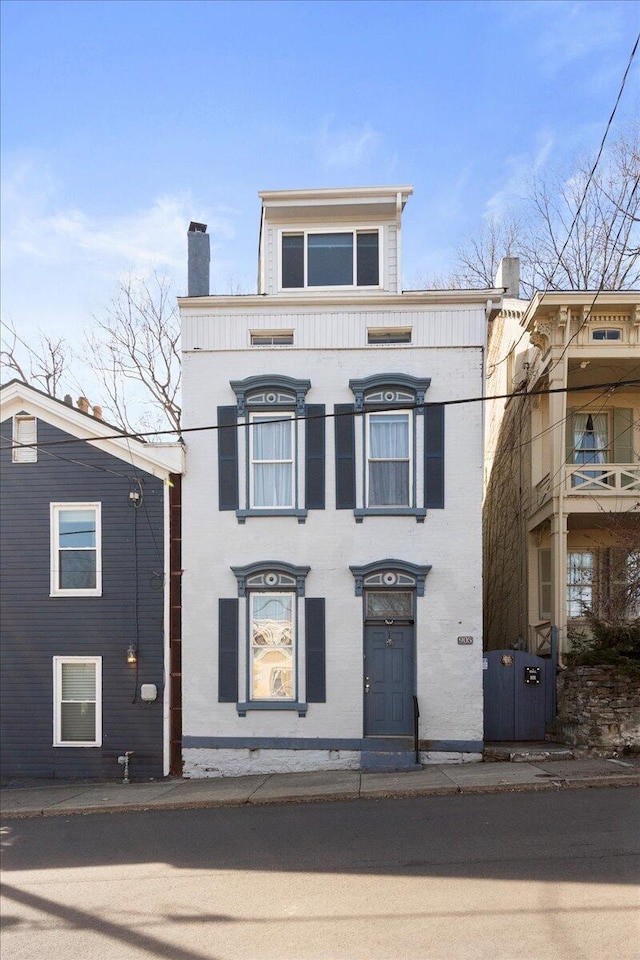 italianate house with a chimney