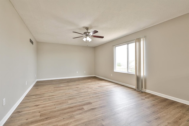 2041 Lafitte Ct, Union, KY 41091 - empty room featuring ceiling fan, light wood finished floors, baseboards, and visible vents