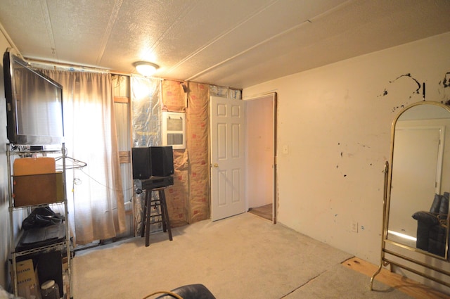 interior space featuring a textured ceiling