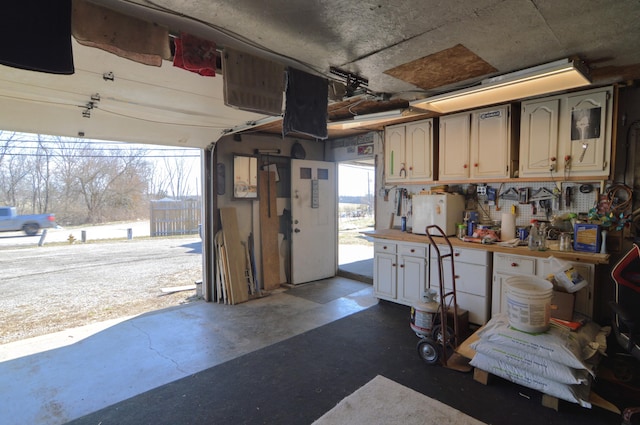 garage featuring a workshop area