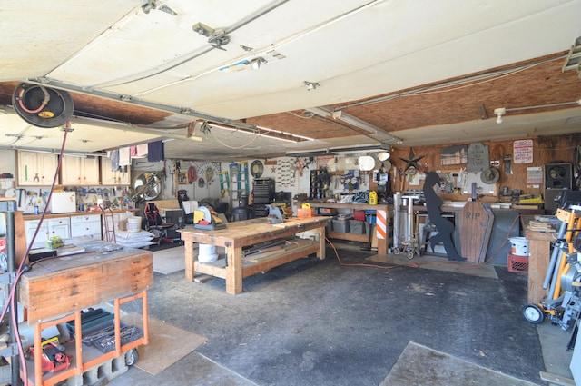 garage with a workshop area