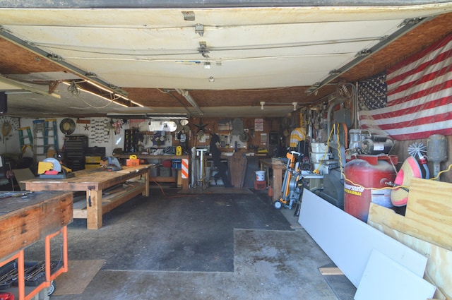 garage with a workshop area