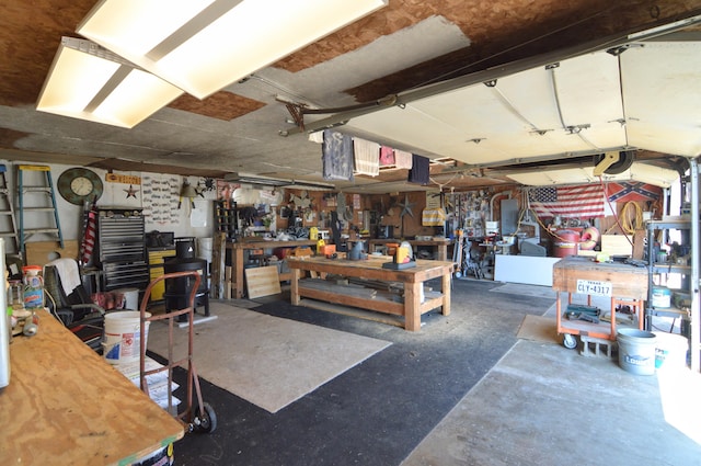 garage with a workshop area