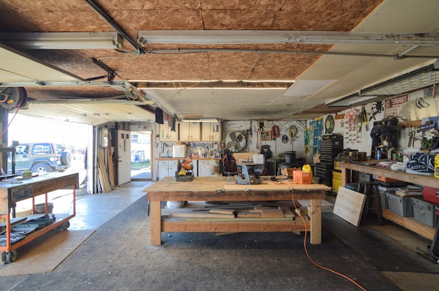 garage with a workshop area