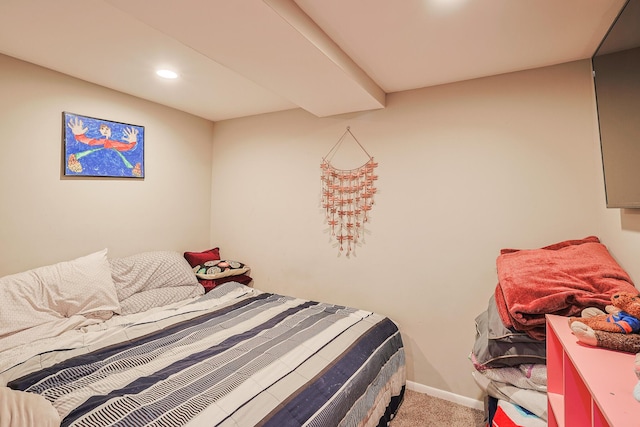 carpeted bedroom featuring baseboards and recessed lighting