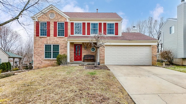 view of front of house featuring driveway, a garage, and brick siding