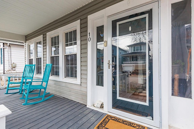 entrance to property with a porch