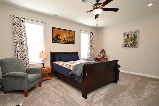 carpeted bedroom featuring baseboards, visible vents, ceiling fan, and recessed lighting