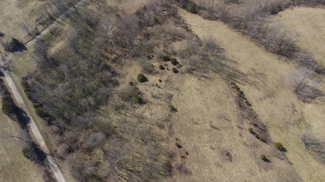 birds eye view of property featuring a rural view