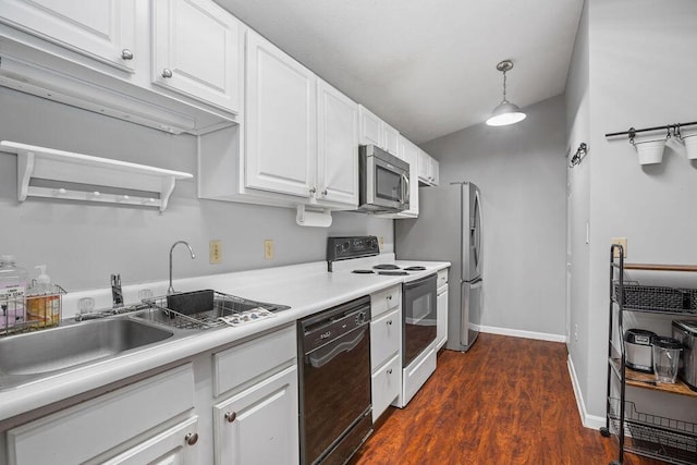 kitchen with light countertops, hanging light fixtures, appliances with stainless steel finishes, dark wood-type flooring, and white cabinetry