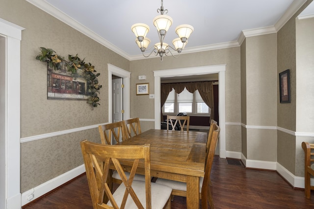 dining room with a chandelier, baseboards, dark wood-style floors, wallpapered walls, and crown molding