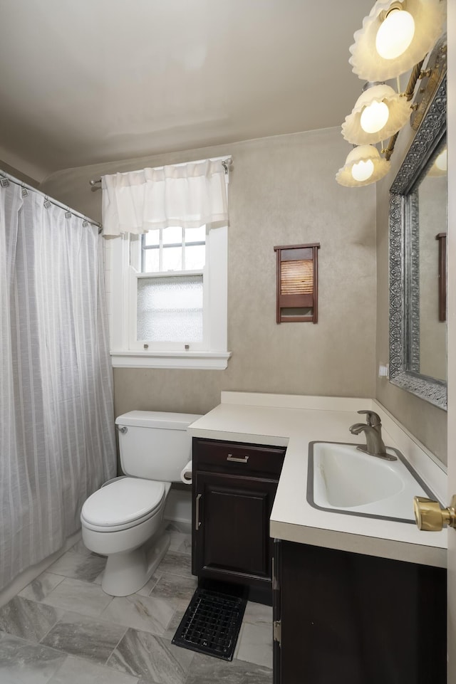 full bathroom with marble finish floor, vanity, and toilet