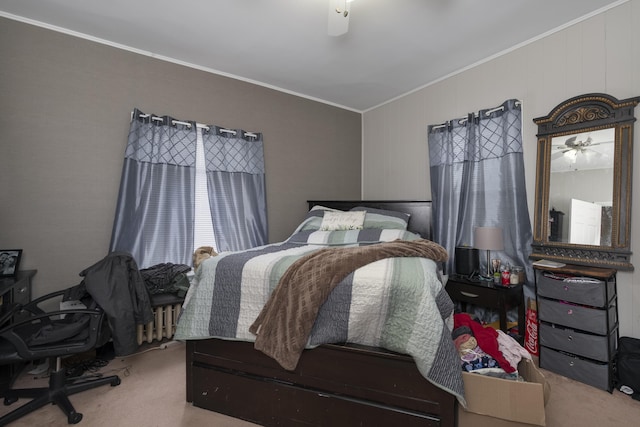 carpeted bedroom featuring ornamental molding