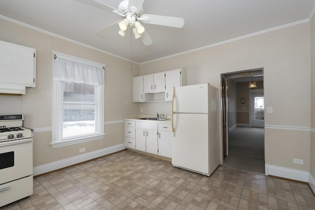 kitchen with white appliances, baseboards, white cabinets, and light countertops