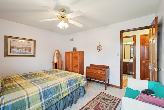 bedroom with baseboards, visible vents, a ceiling fan, and light colored carpet