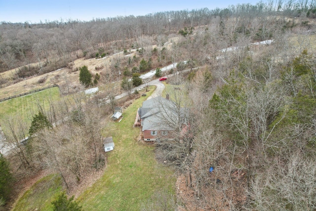 aerial view with a wooded view