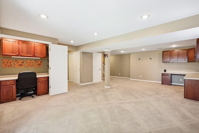 office featuring recessed lighting, baseboards, light carpet, and built in desk