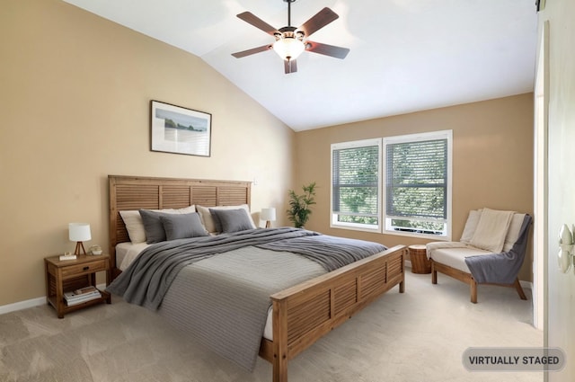 bedroom featuring lofted ceiling, a ceiling fan, baseboards, and light carpet