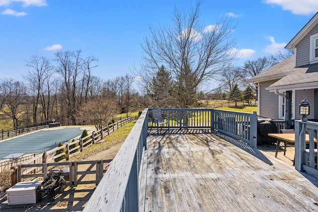 wooden deck featuring fence