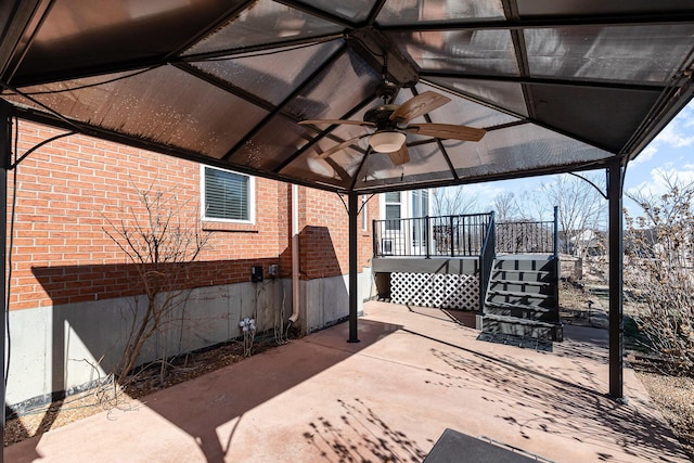 view of patio with ceiling fan