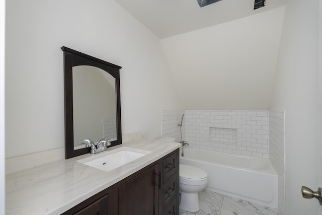 full bathroom with marble finish floor, vanity, toilet, and a bathing tub