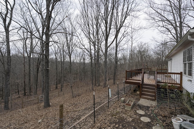 view of yard featuring a wooden deck