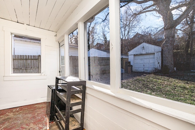 sunroom / solarium with wood ceiling