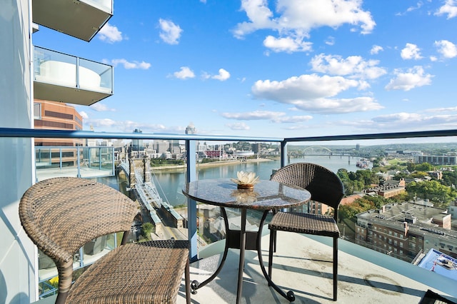 balcony featuring a water view