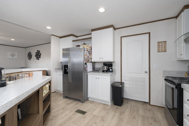 kitchen with stainless steel fridge, visible vents, black electric range, light wood-style floors, and open shelves