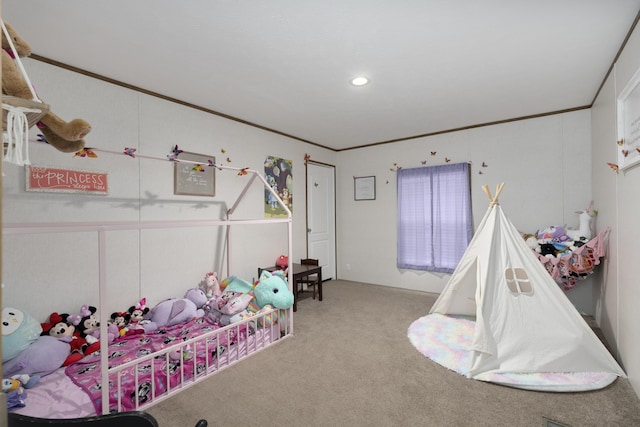 game room with carpet floors and ornamental molding