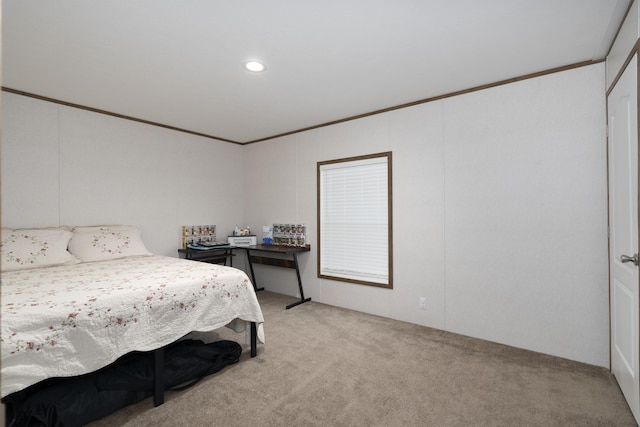 bedroom with light carpet and crown molding