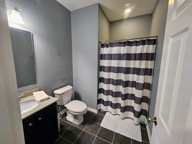 full bath featuring a shower with shower curtain, toilet, vanity, tile patterned flooring, and baseboards