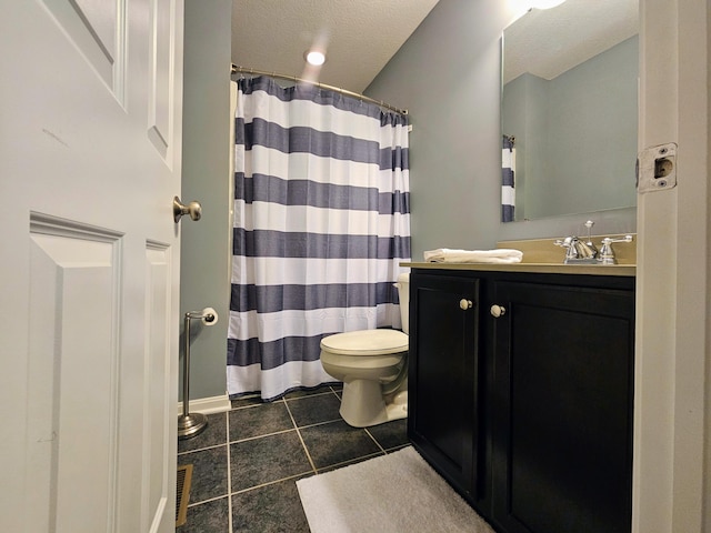 bathroom with a shower with shower curtain, toilet, a textured ceiling, vanity, and tile patterned floors