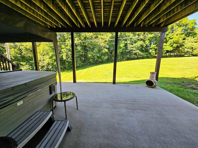 view of patio / terrace featuring a hot tub