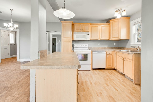 kitchen featuring white appliances, light wood finished floors, a baseboard radiator, light brown cabinetry, and a sink