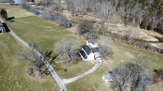 birds eye view of property with a rural view