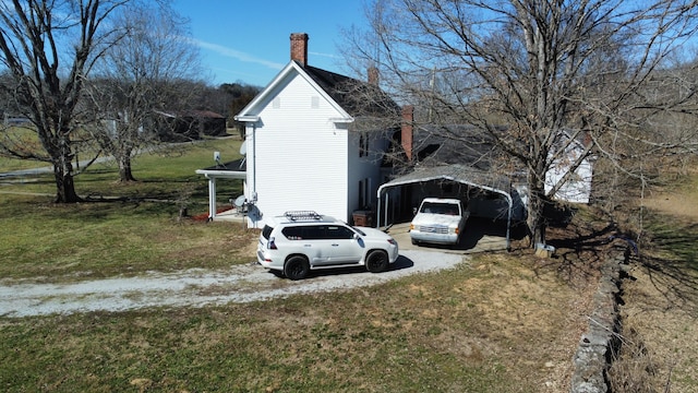 view of yard with a detached carport