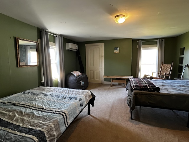 carpeted bedroom with a wall mounted AC