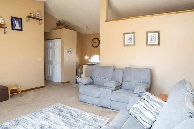 living room featuring carpet, baseboards, and vaulted ceiling