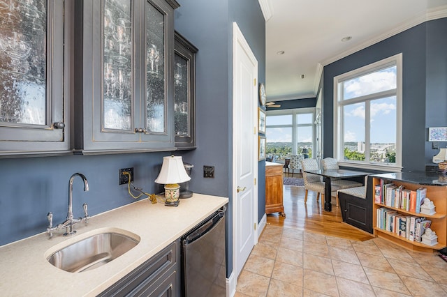 kitchen with dishwashing machine, a sink, glass insert cabinets, and crown molding